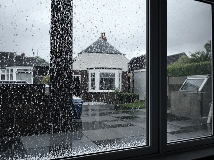 Rain on patio door glass in a Cardiff terraced home