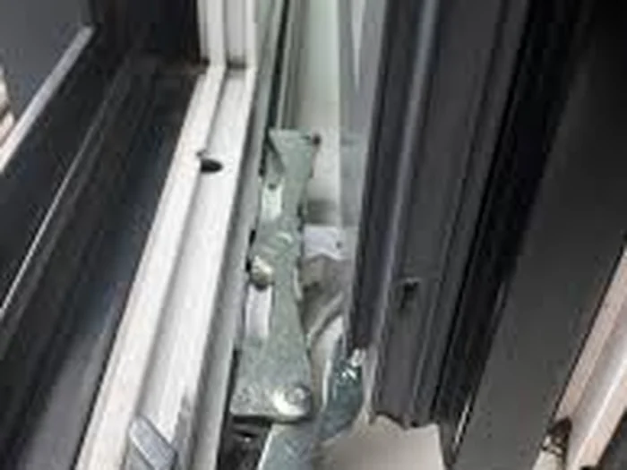 Salt corrosion on an aluminium door track near the coast