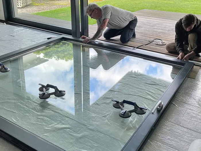 Measuring a door opening and noting the dimensions