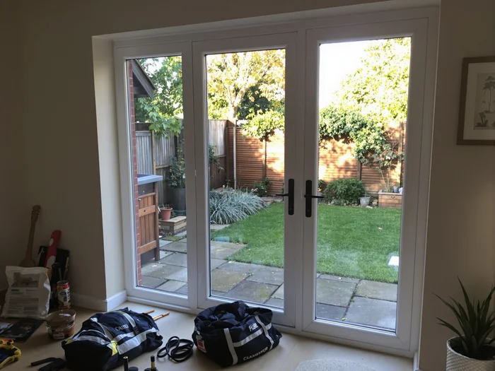 A completed patio door repair with the work area left clean